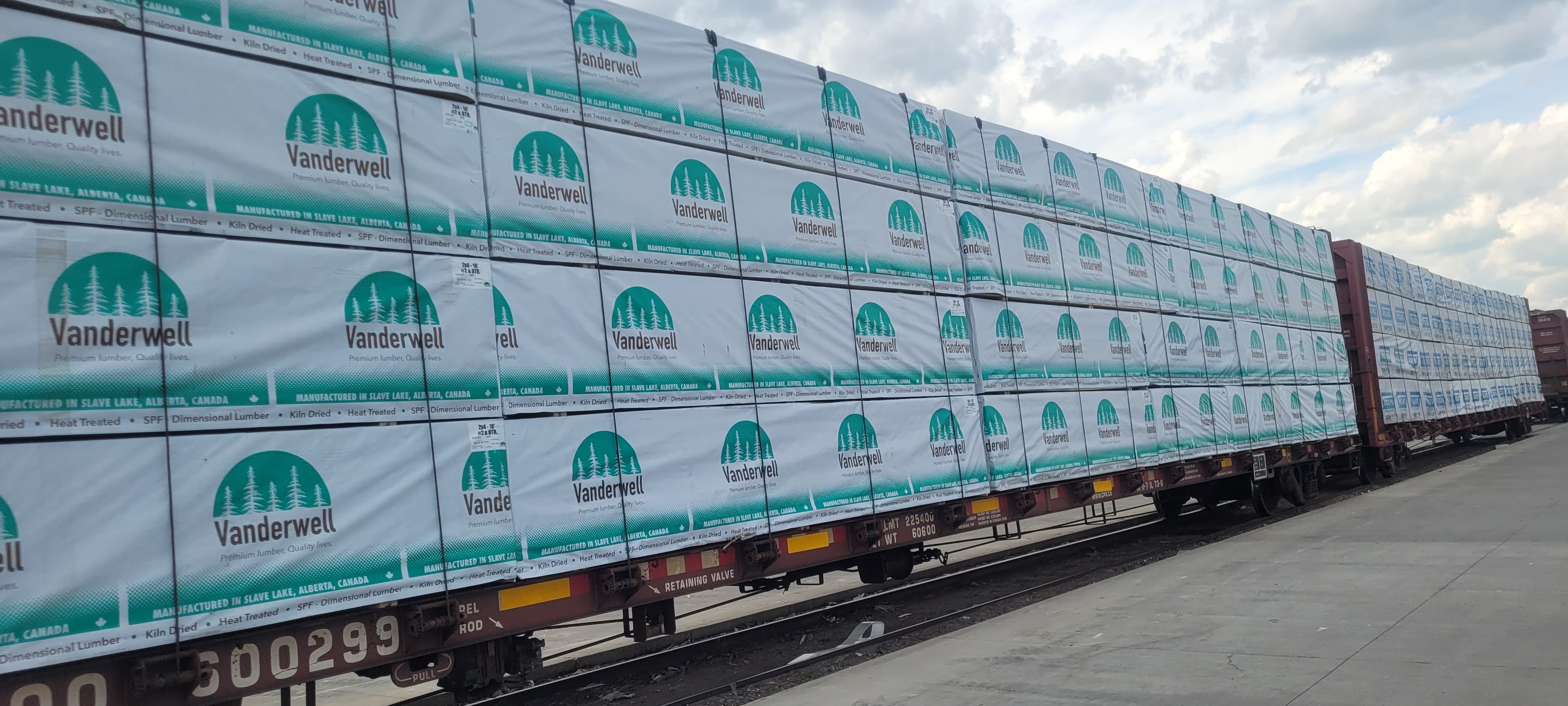 Long shot of Vanderwell lumber on a freight train