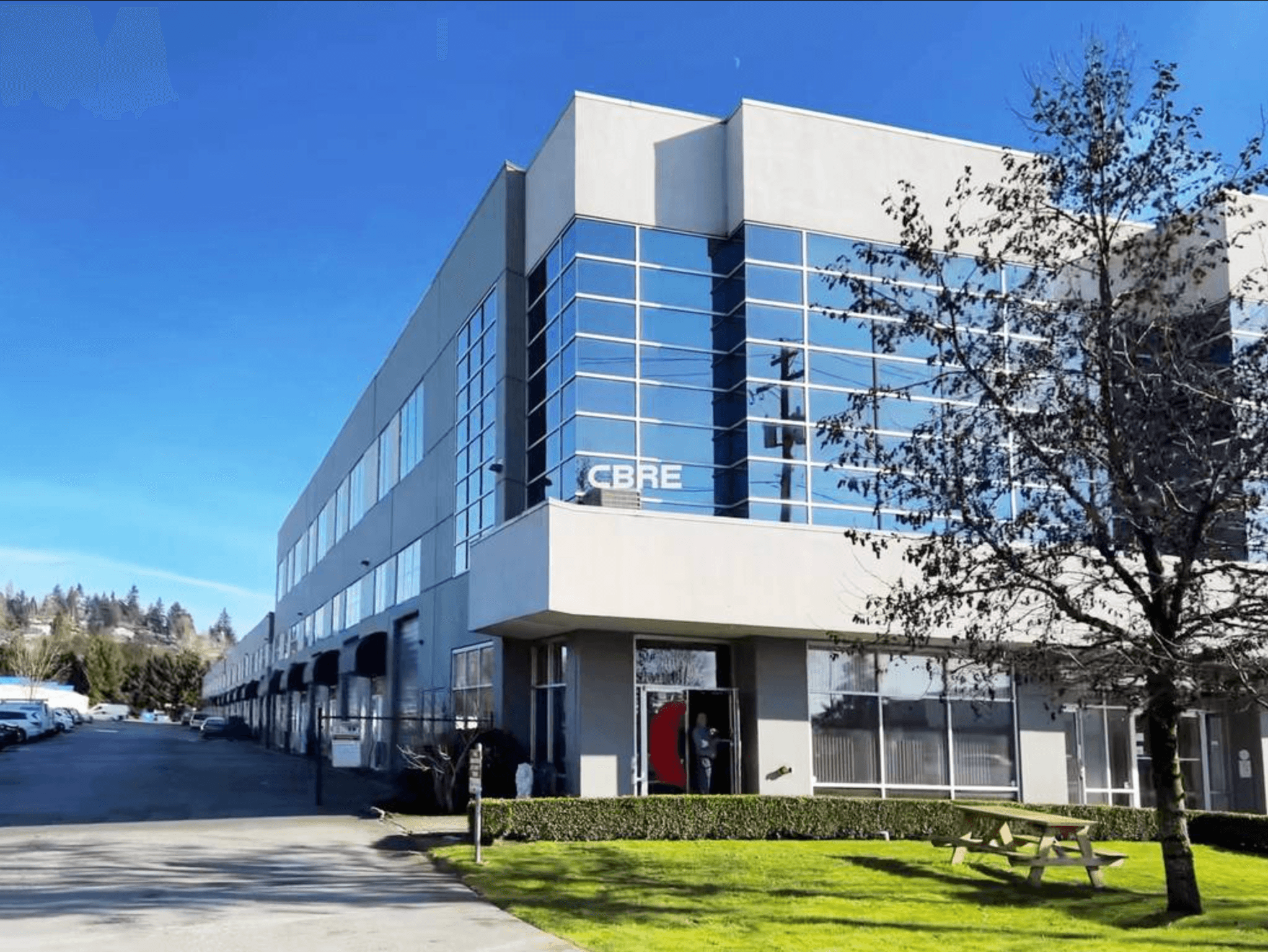 A modern commercial real estate building, representing Canasia new development ventures.